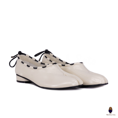 WoodchuckSato Ivory Leather Tabi Mary Jane Heels with Black