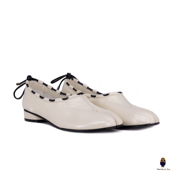 WoodchuckSato Ivory Leather Tabi Mary Jane Heels with Black Rope Trim